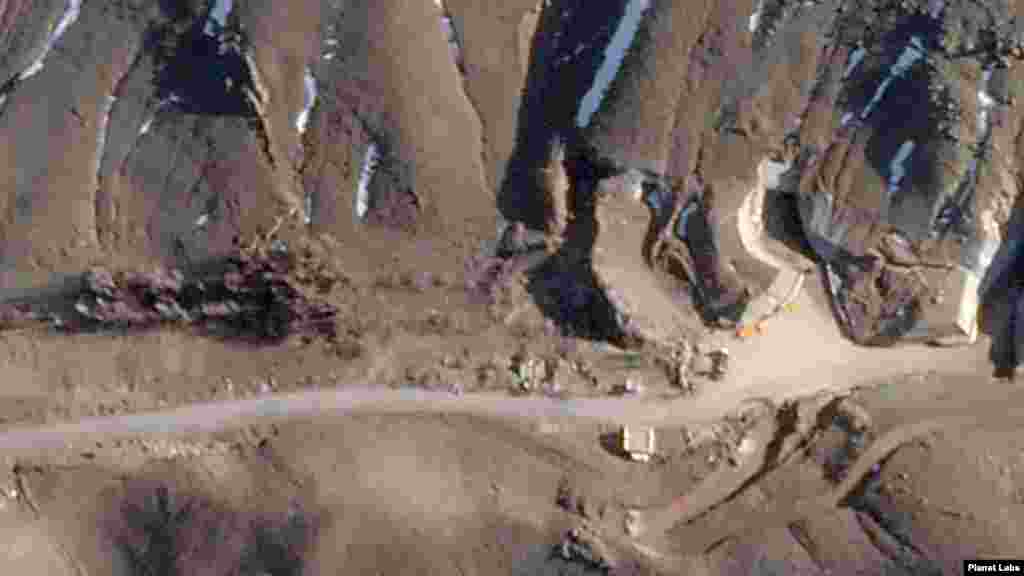 A close-up of the satellite image on the right shows damage to a large tunnel entrance.