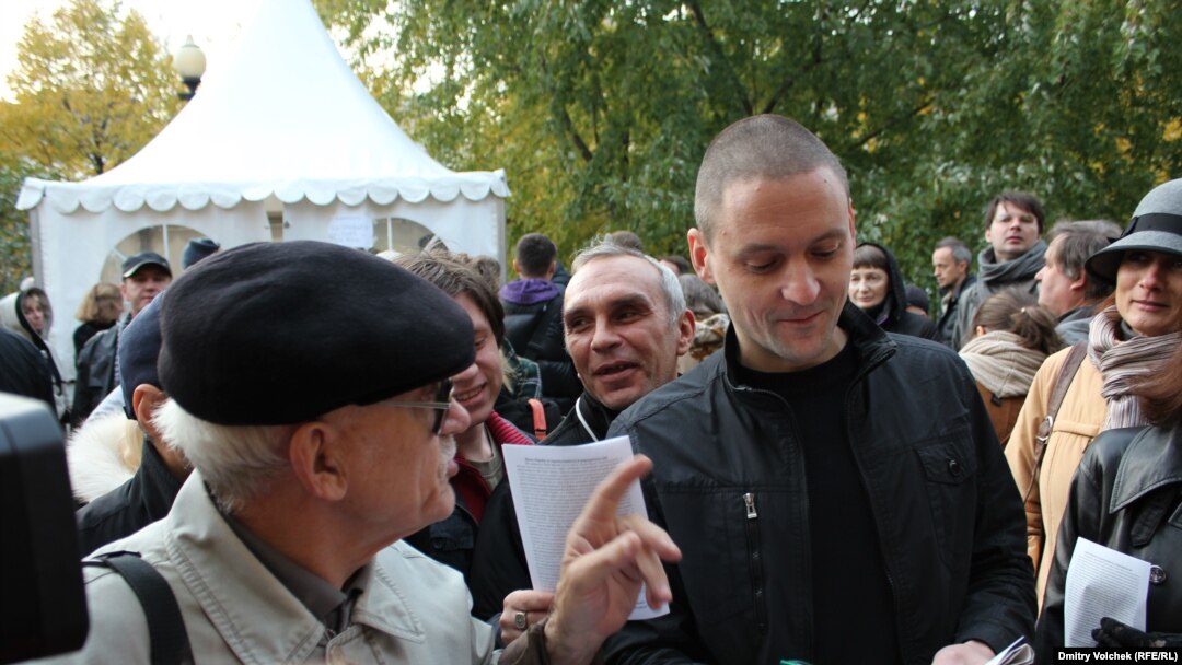 The foreign funding is at the heart of allegations leveled against Russian opposition leader Sergei Udaltsov (right).