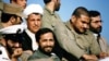 علی شمخانی همراه محسن رفیقدوست، کمال خرازی و علی صیادشیرازی در یکی از بازدیدهای اکبر هاشمی رفسنجانی از جبهههای جنگ ایران و عراق در اواسط دههٔ ۶۰ خورشیدی