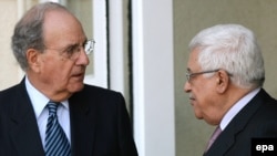 U.S. special envoy George Mitchell (left) with Palestinian President Mahmud Abbas in Ramallah in January