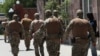 Armenia - Masked law-enforcement officers leave Electric Networks of Armenia (ENA), 8 July, 2025