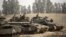 Israeli tanks stationed at the Israeli-Gaza Strip border on November 16