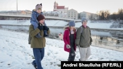 RFE/RL Belarus Service journalist Andrey Kuznechyk (left) spends time with his family in Vilnius after his release from prison in Belarus. 