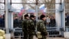 On the blocked territory of the military unit, servicemen lined up in the form of a trident