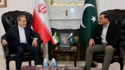 دیدار عباس عراقچی با عاصم منیر (راست) 