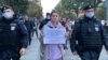 The protesters held up small placards reading, "There are no foreign agents, there are journalists."