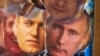 Rusia: măști cu președintele Vladimir Putin si opozantul Alexei Navalnîi.