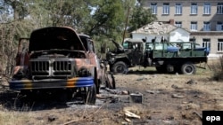 Ukraine -- Destroyed Ukrainian military vehicles seen in Ilovaisk, some 50 km from Donetsk, 3Sep2014