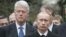 Former U.S. President Bill Clinton (left) and Russian President Vladimir Putin attend the funeral of Putin's predecessor, Boris Yeltsin, in Moscow in April 2007.