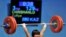 Казахстанская спортсменка Зульфия Чишанло на прошлом чемпионате мира по тяжелой атлетике в Южной Корее завоевала золотую медаль. Гоянг, 22 ноября 2009 года.