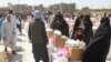 World Food Programme staff distribute food aid in Herat in August.