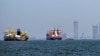 Commercial vessels are pictured offshore in Dubai on March 11.