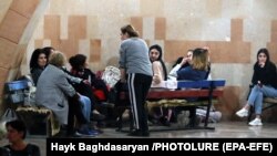 NAGORNO KARABAKH -- People hide in a basement used as shelter from alleged Azerbaijani shelling in Stepanakert, 30 September 2020