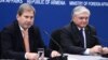 Armenia - Foreign Minister Edward Nalbandian (R) and EU Commissioner for European Neighbourhood Policy and Enlargement Johannes Hahn give a joint press conference in Yerevan, 18Mar2015.