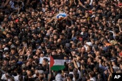 Varrimi i liderit të vrarë të grupit militant palestinez, "Strofka e luanëve". Nablus, 25 tetor 2022.
