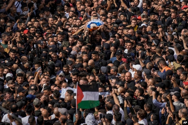 Varrimi i liderit të vrarë të grupit militant palestinez, "Strofka e luanëve". Nablus, 25 tetor 2022.