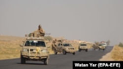 Afghan forces patrol the highway between Kandahar and Helmand. (file photo)