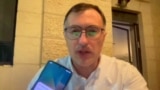 Grab: Israel -- interviewee shows air-raid alert on his phone, Mevaseret Zion, October 1, 2024