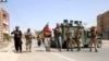 Бойцы службы безопасности охраняют блокпост в районе Пули-Малан района Гузара в Герате, Афганистан, 30 июля 2021 г.