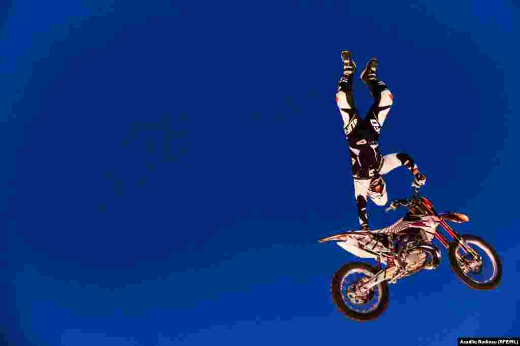 Daredevil motorcycle riders thrill the public during the Red Bull X Fighters Jams show in Baku, Azerbaijan. (RFE/RL)