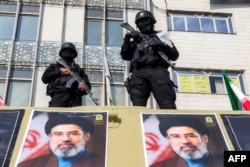 Security forces deploy to guard a rally in support of Iran's new supreme leader, Mojtaba Khamenei, at Enqelab Square in central Tehran, March 9