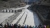 Прорыв другой плотины в Индии, фото 2021 года