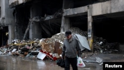The aftermath of an Israeli strike on a building in central Beirut.