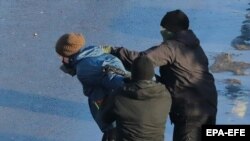 According to one monitoring group, more than 100 people were detained in Misnk on March 10. (file photo)