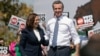 U.S. Vice President Kamala Harris (left) stands with California Governor Gavin Newsom during a campaign event in San Leandro, California, in September 2021.