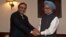 Indian Prime Minister Manmohan Singh (right) shakes hands with Pakistan President Asif Ali Zardari during a meeting in New Delhi on April 8.