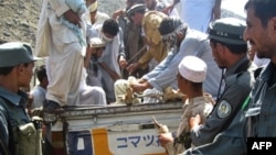The body of Japanese aid worker Kazuya Ito being evacuated from Nangahar Province