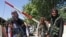 Luftëtarë talibanë në Kabul në gusht të vitit 2021, kur grupi militant rimori kontrollin e Afganistanit. 