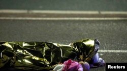 France -- A body is seen on the ground July 15, 2016 