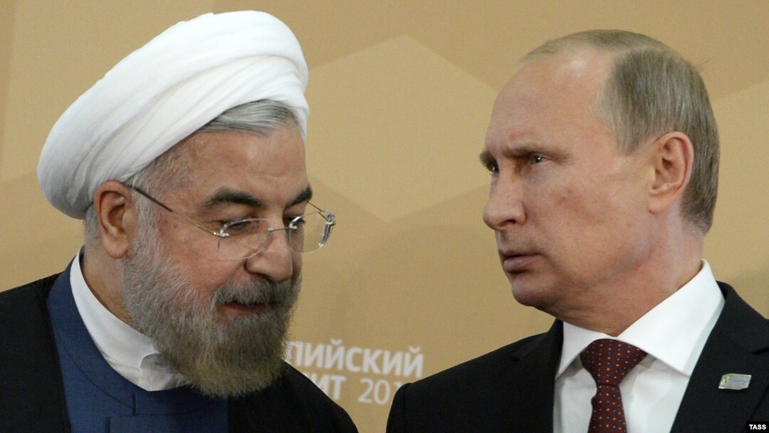 از راست: پوتین و روحانی، رئیسان جمهوری روسیه و ایران، طی دیداری سپتامبر ۲۰۱۴