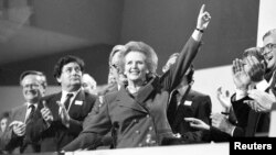 British Prime Minister Margaret Thatcher receives a standing ovation at the Conservative Party Conference on October 13, 1989.