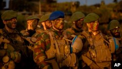 Ushtarë belgë duke marrë pjesë në një stërvitje ushtarake të NATO-s, në Lituani, më 2022.