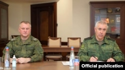 Armenia -- Lieutenant-General Rustam Muradov (R), the commander of Russian peacekeepering forces stationed in Nagorno-Karabakh, meets with Armenian Defense Minister Vagharshak Harutiunian, Yerevan, February 10, 2021.