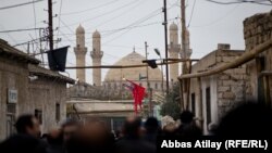 Ашура - церемония поминовения Имама Гусейна в поселке Нардаран близ Баку. 25 ноября 2012