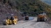 Armenia -- Workers refurbish a road in Syunik region.