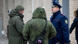 Investigators work at the blast scene, which killed the commander of Russian armed forces' chemical, biological and radiation defence troops, Igor Kirillov, and his assistant, according to the Russian Investigative Committee, outside a residential buildin