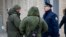 Investigators work at the blast scene, which killed the commander of Russian armed forces' chemical, biological and radiation defence troops, Igor Kirillov, and his assistant, according to the Russian Investigative Committee, outside a residential buildin