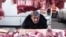 Georgia -- A vendor sells meat for the New Year meal on a street market in Tbilisi, 29Dec2009