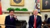 U.S. President Donald Trump meets with Japanese Prime Minister Shinzo Abe, in the Oval Office of the White House in Washington, June 7, 2018