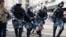 Полиция задерживает участника протеста. Москва, 3 августа 2019 года