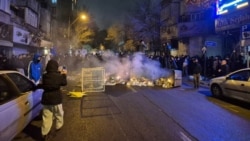 Protesters demonstrate on the streets of the Iranian capital, Tehran. 