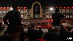 Mourners gather to pay tribute to Iran's late supreme leader Ayatollah Ali Khamenei at the Grand Mosalla on the second day of funeral ceremonies in Tehran.