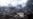 Destroyed buildings smolder in a residential area of the Kyiv suburb of Vyshneve following Russian missile and drone strikes on the Ukrainian capital on July 6. 