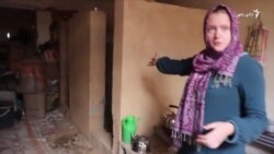 پولنډۍ مېرمن د غور په یوه ښوونځې کې ښوونکې