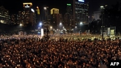 Hong Kong's Victoria Park during a candlelight vigil to mark the 20th anniversary of the Tiananmen crackdown by Beijing