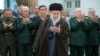 Iranian Supreme Leader Ayatollah Ali Khamenei (center) leads a prayer during his meeting with a group of senior military leaders in Tehran on April 21. 